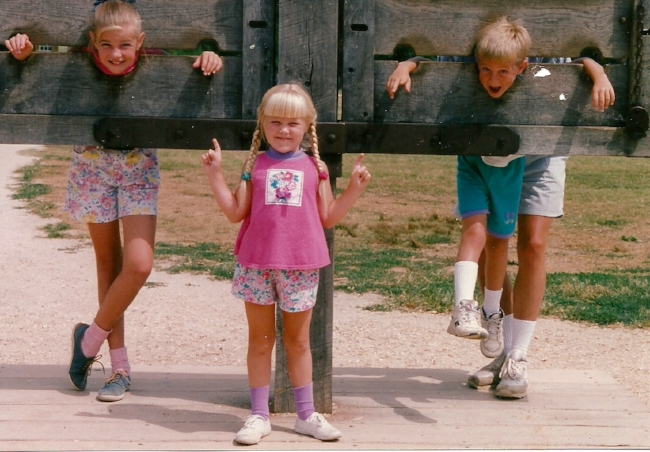 I grew up in southwestern Virginia, so visits to historic Williamsburg came with the territory. Here's me, my 4-years younger brother and 5-years younger sister. Also, my dad's legs and high socks.&nbsp;